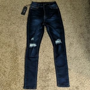 Dark wash distressed jeans